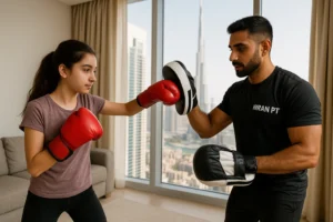 Teen girl boxing workout at home in Dubai with certified trainer wearing imran pt logo